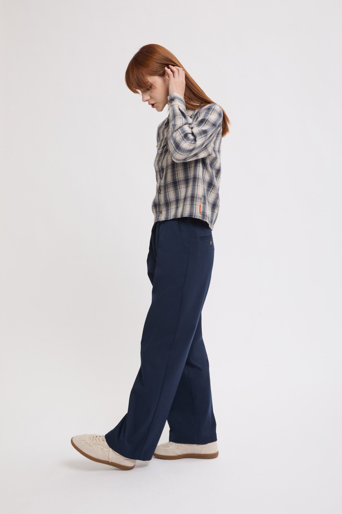 Pantaloni ampi con pinces