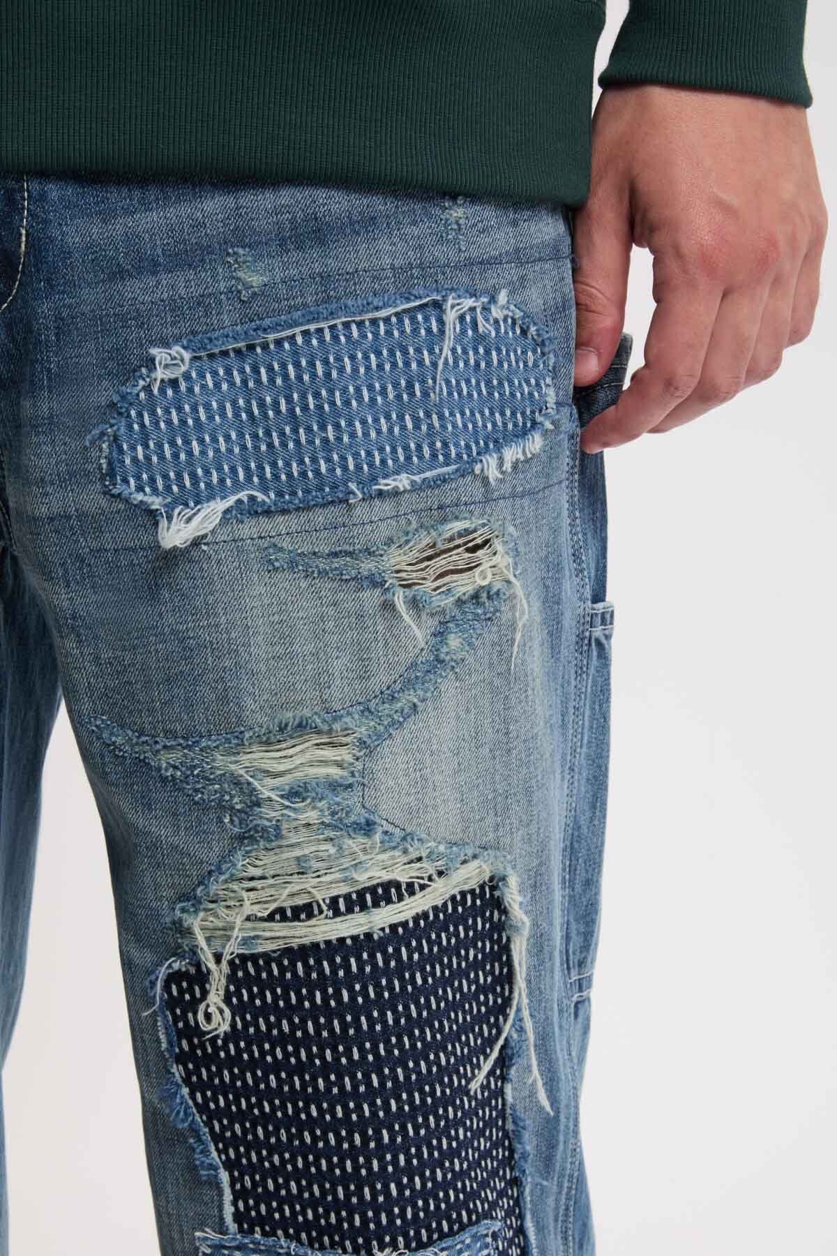 Pantaloni in denim con patch