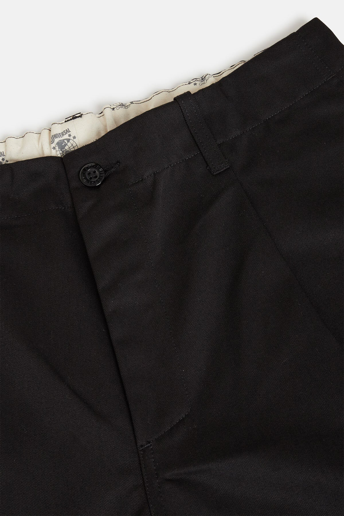 Pantaloni in twill a vestibilità affusolata con piega interna